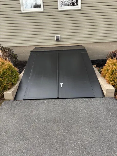 stairs are now covered by a clean and fresh cellar door